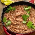 A skillet with homemade refried beans