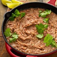 A skillet with homemade refried beans