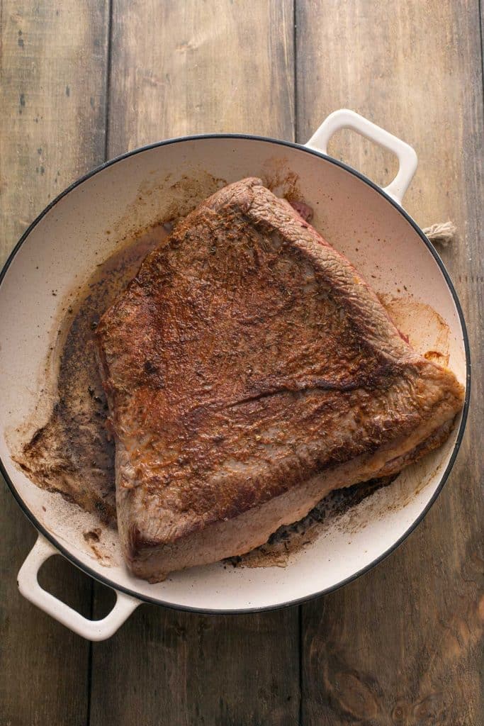 pan-seared brisket in a large dutch oven