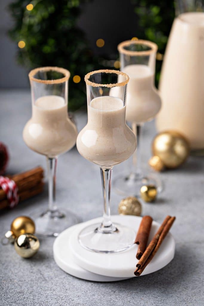 Glasses filled with creamy coconut and cinnamon cocktail