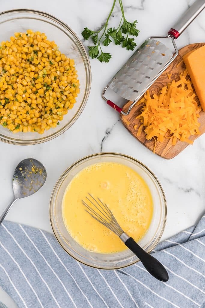 milk and eggs whisked in a medium bowl.