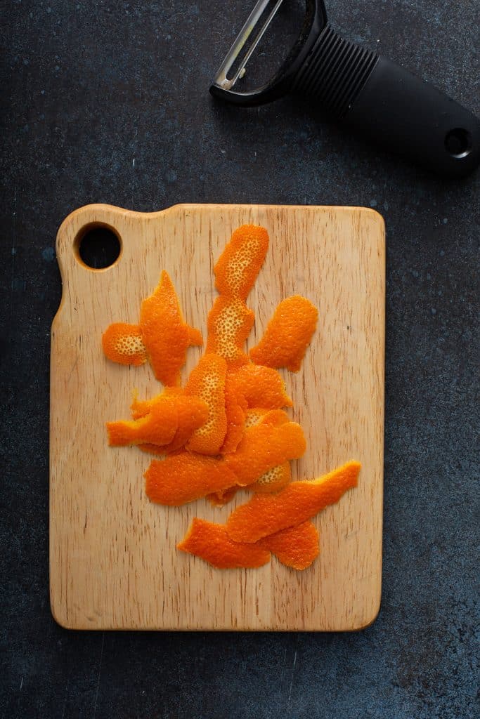 orange peel in a wooden board