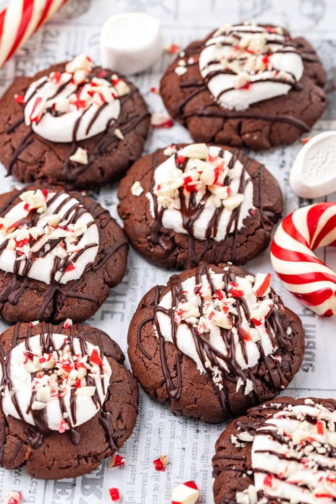 peppermint hot chocolate cookies topped with melted marshmallow and crushed peppermint candy 