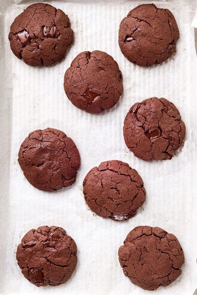 eight Hot Chocolate Peppermint cookies in a baking sheet.