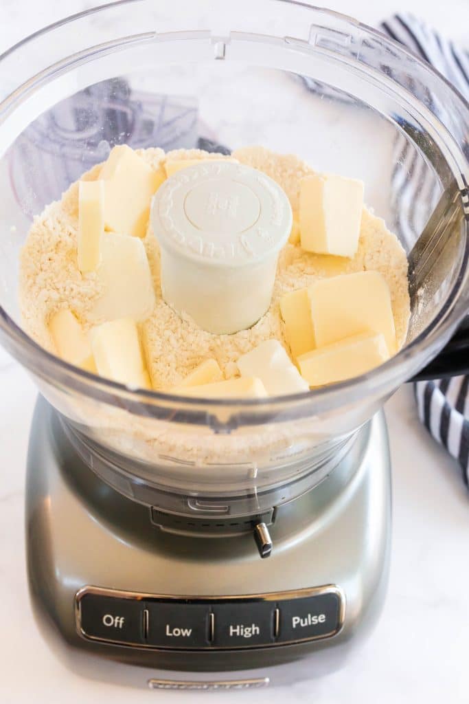 adding cold butter cubes to the dry ingredients.