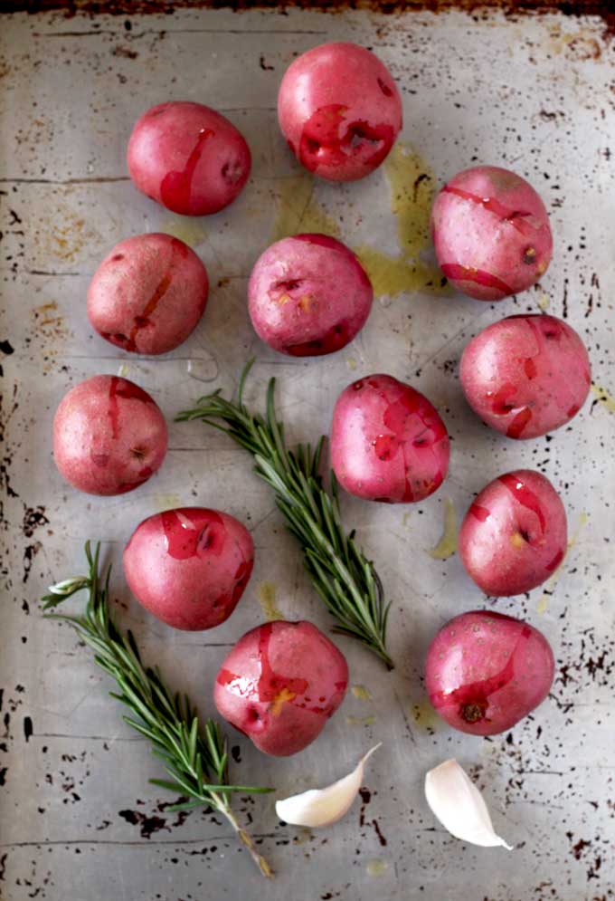 top view of red potatoes in a baking sheet