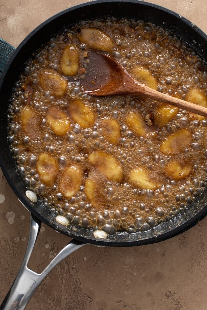 bubbly bananas foster in a hot pan