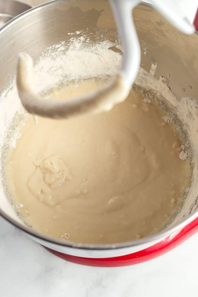 milk, water, eggs, sugar, salt and some of the flour mixed together