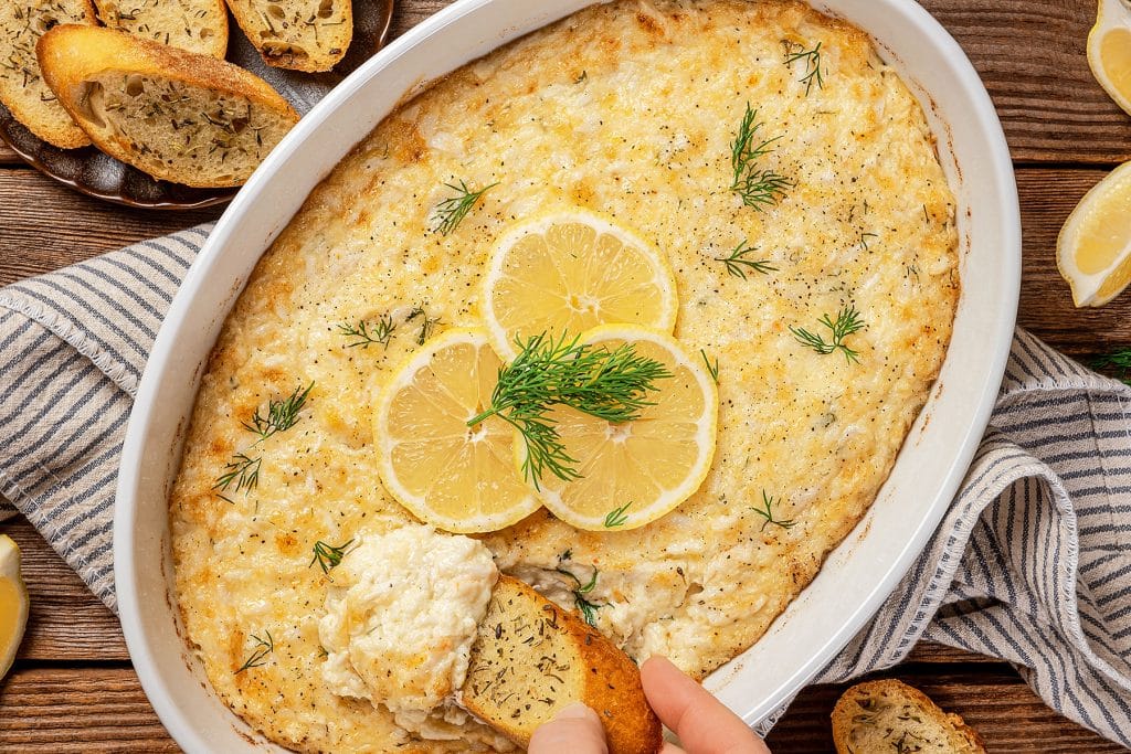 Warm and cheesy crab dip in a baking dish