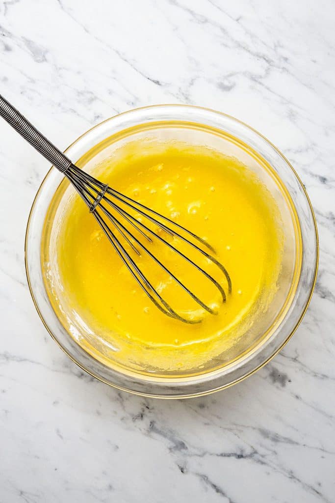 whisking the egg yolks with the sugar and cornstarch