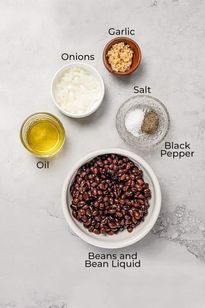 Ingredients to make refried beans with canned beans