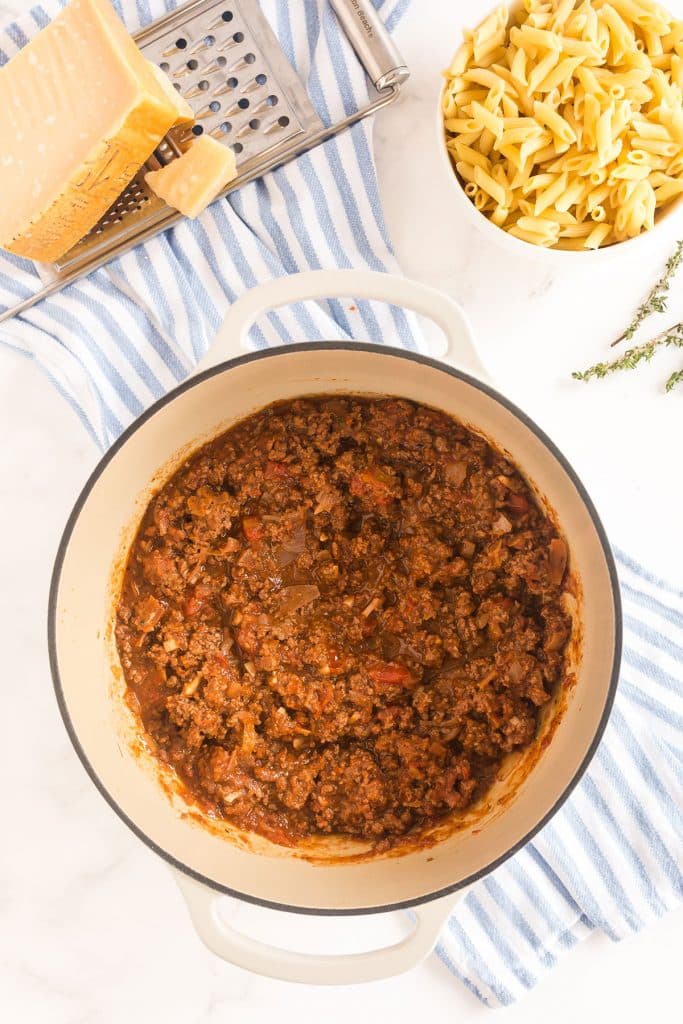 Pastitsio meat sauce in a dutch oven