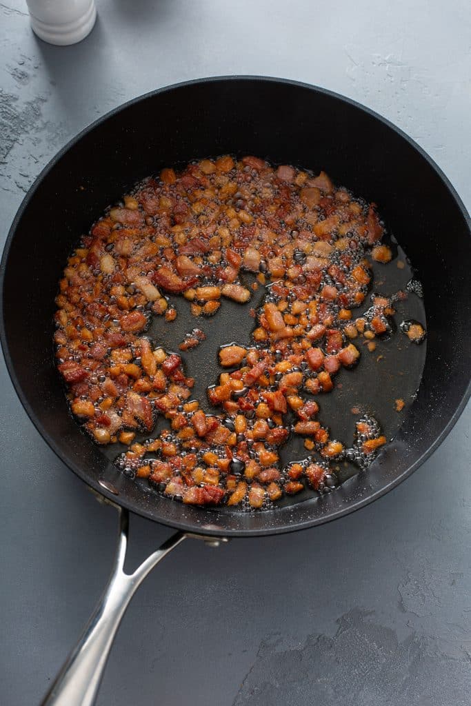 cooking pancetta in a skillet