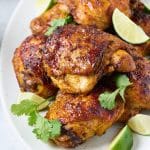 Pollo asado pieces served on a plate