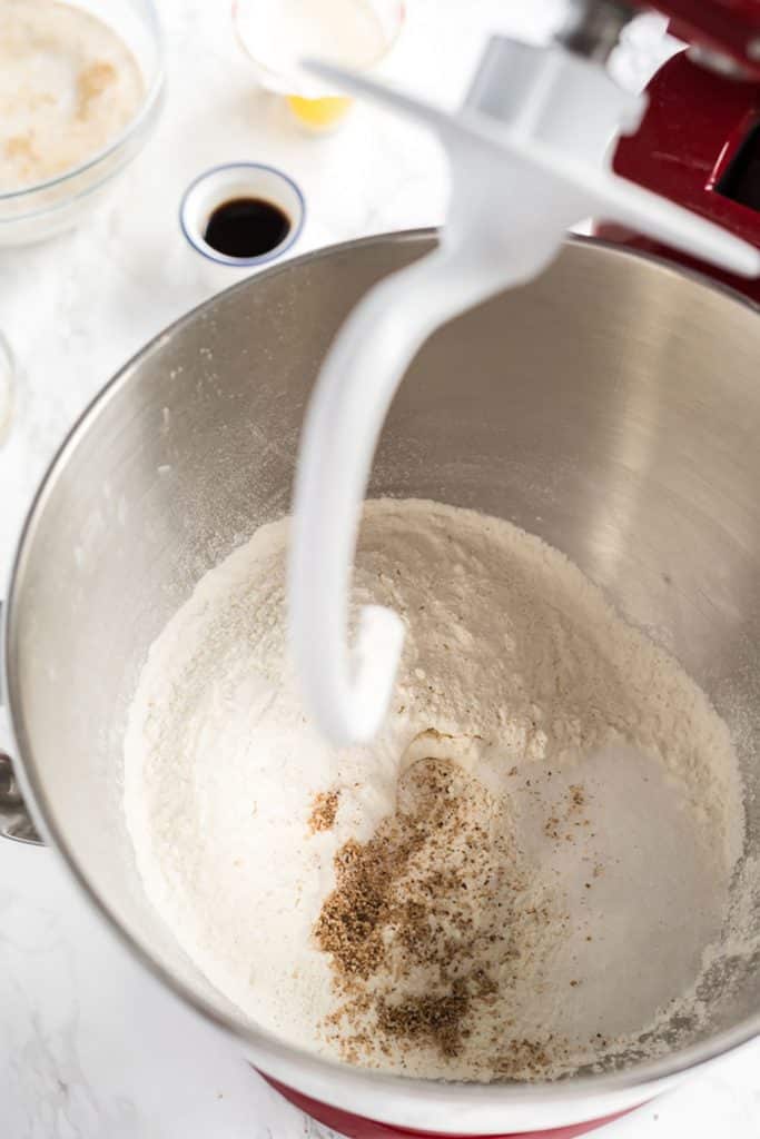 flour, sugar, salt and nutmeg in the bowl of a stand mixer fitted with the dough hook attachment