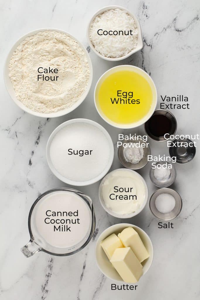 ingredients to make cake in bowls
