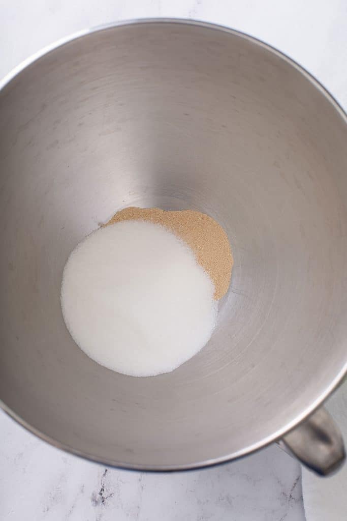 yeast, salt and sugar in a mixing bowl.