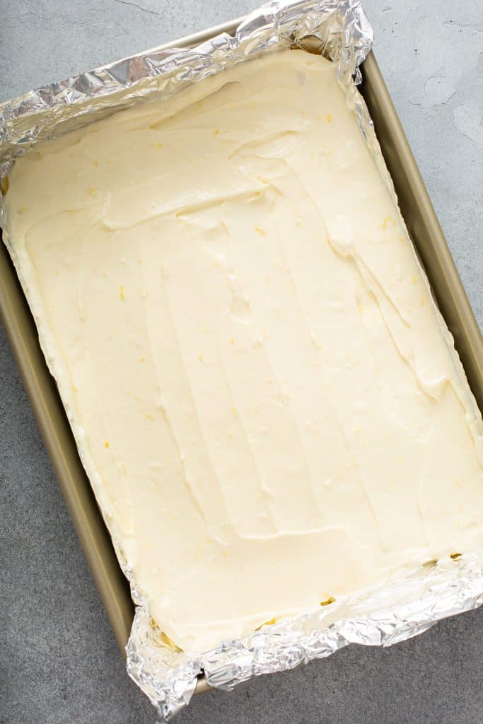 cream cheese filling over the cake mix crust