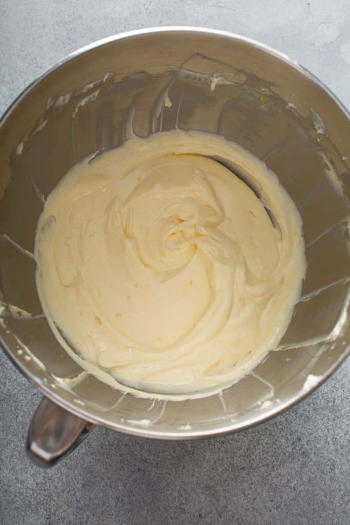 cream cheese, sugar, egg and lemon juice combined in the bowl of a standing mixer