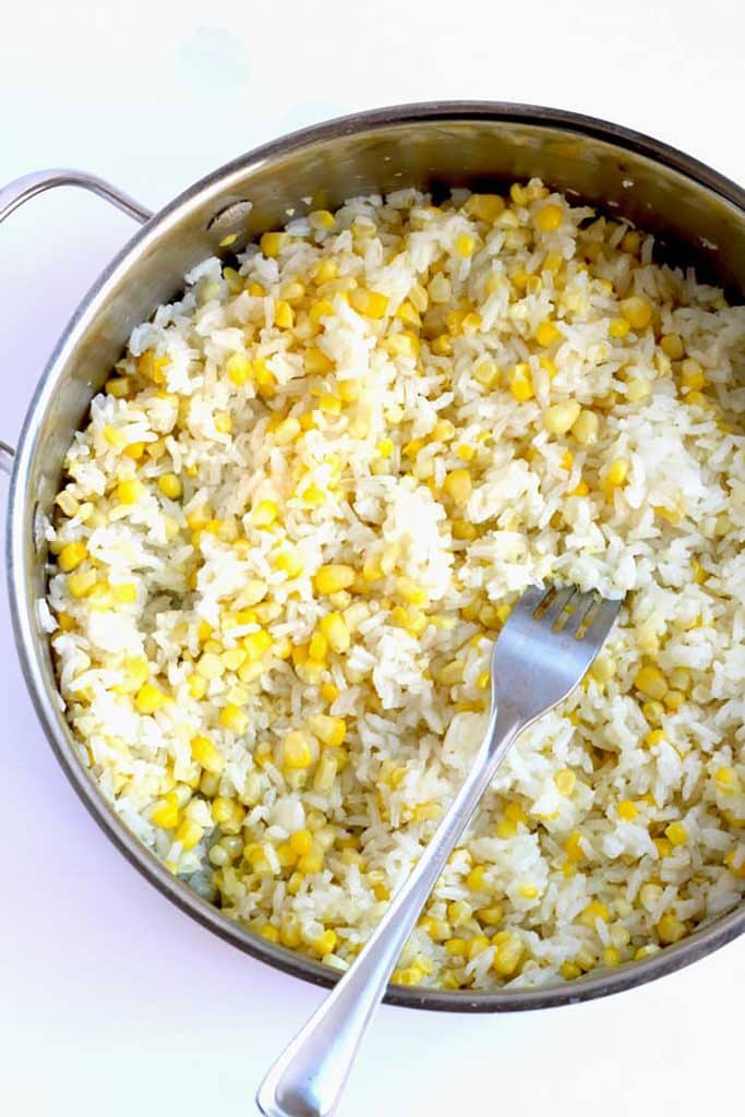 cooked white rice with corn