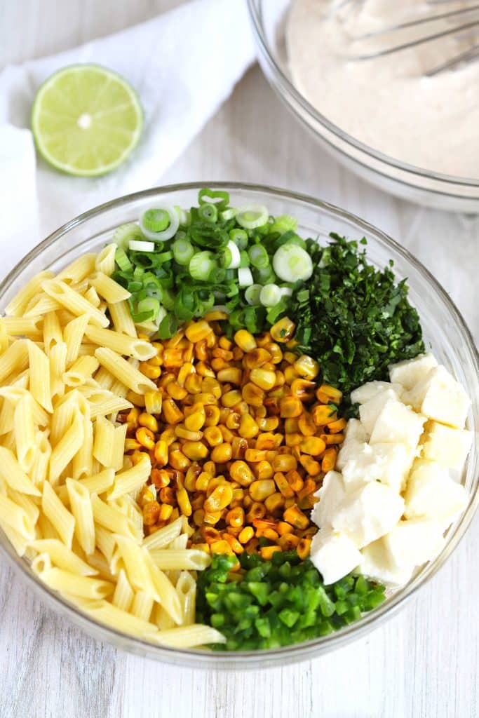 ingredients to make the Mexican Street corn salad in a bowl