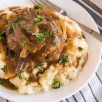 salisbury steak on a plate with fork