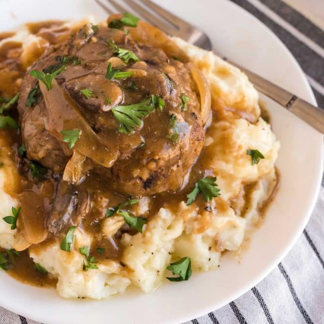 salisbury steak on a plate with fork