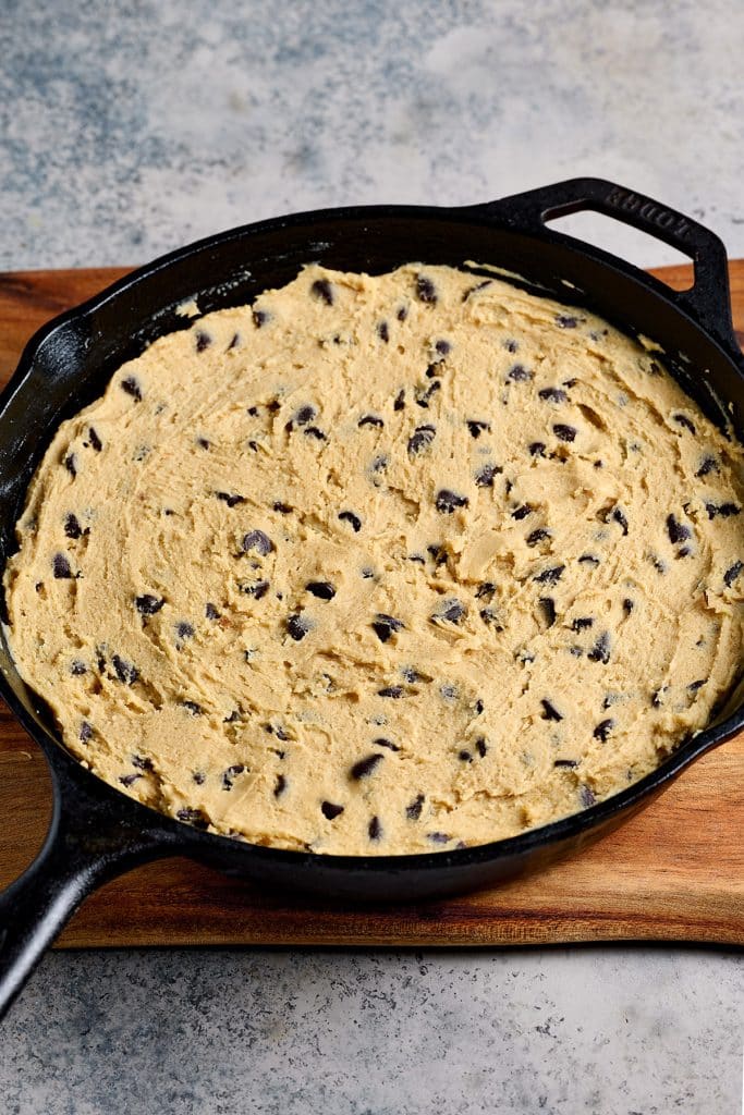 chocolate chip cookie dough on a skillet