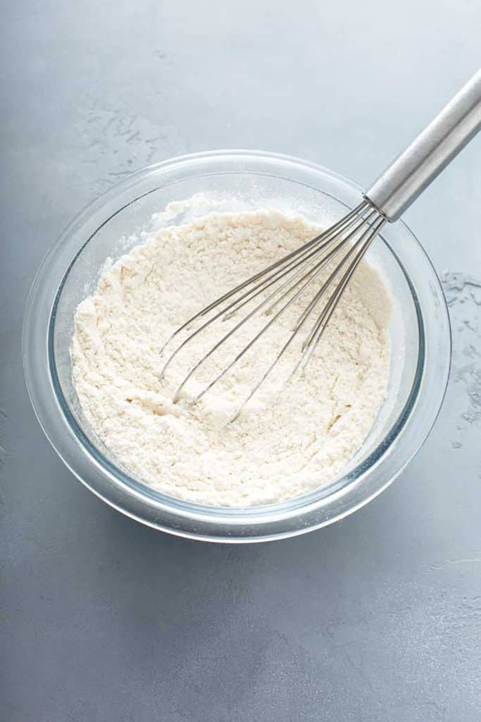 flour, baking powder and salt in a bowl with a whisk