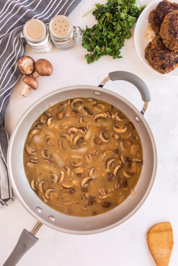 Mushroom and onion brown gravy in a skillet