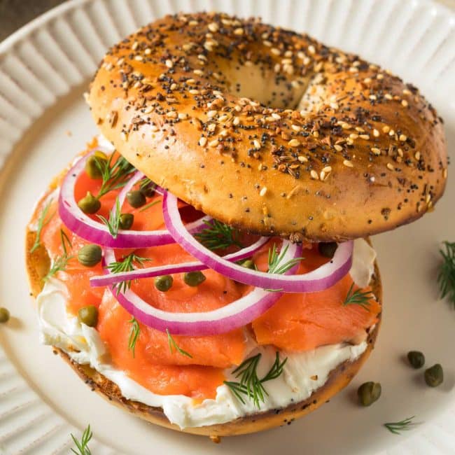 smoked salmon, sliced onions, capers and cream cheese on am everything bagel