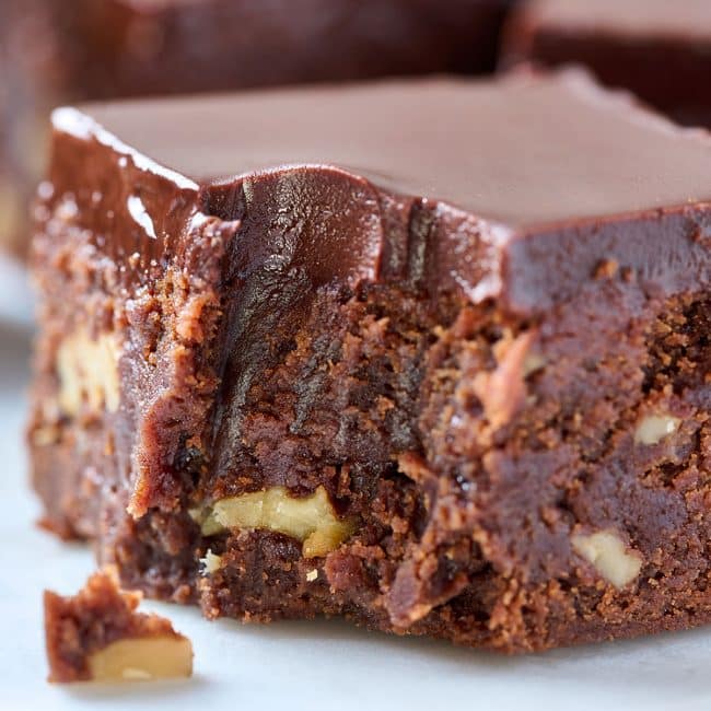 Decadent chocolate brownie covered with chocolate ganache