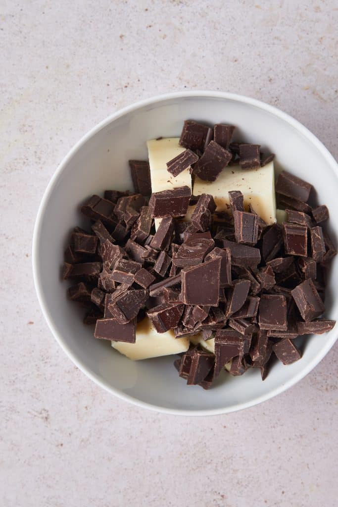 pieces of chocolate and butter in a bowl