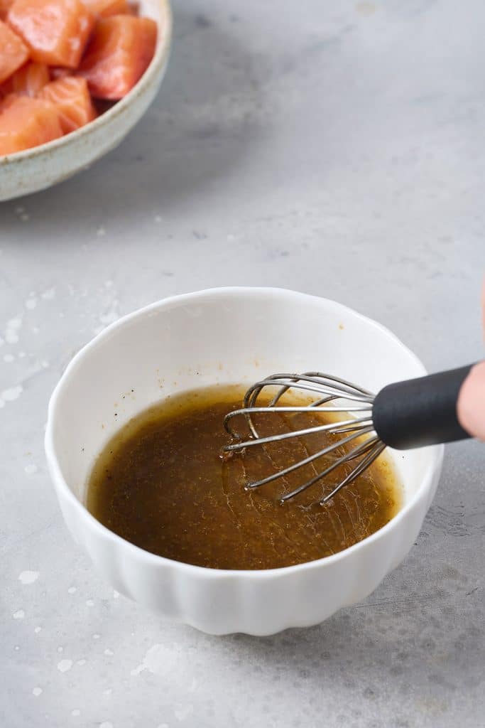 Buttery honey soy marinade in a small bowl