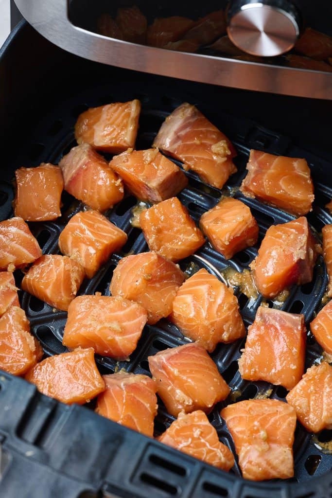 Bite size salmon pieces in an air fryer