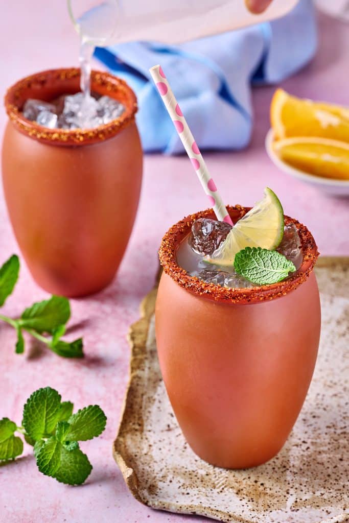 cantaritos cocktails in mugs with straw