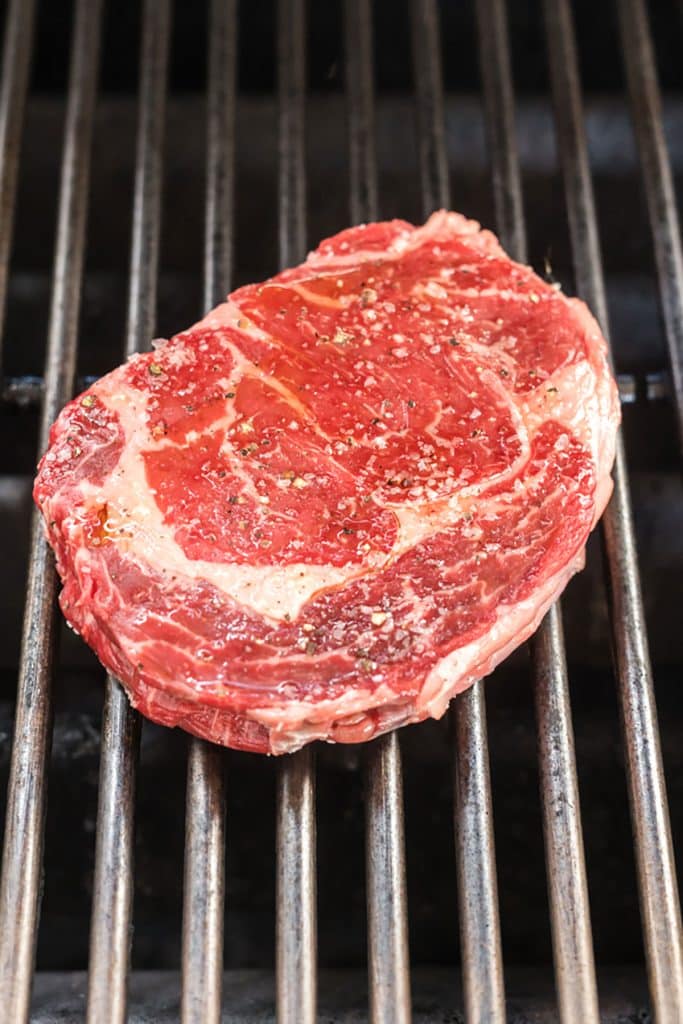 ribeye steak on a grill