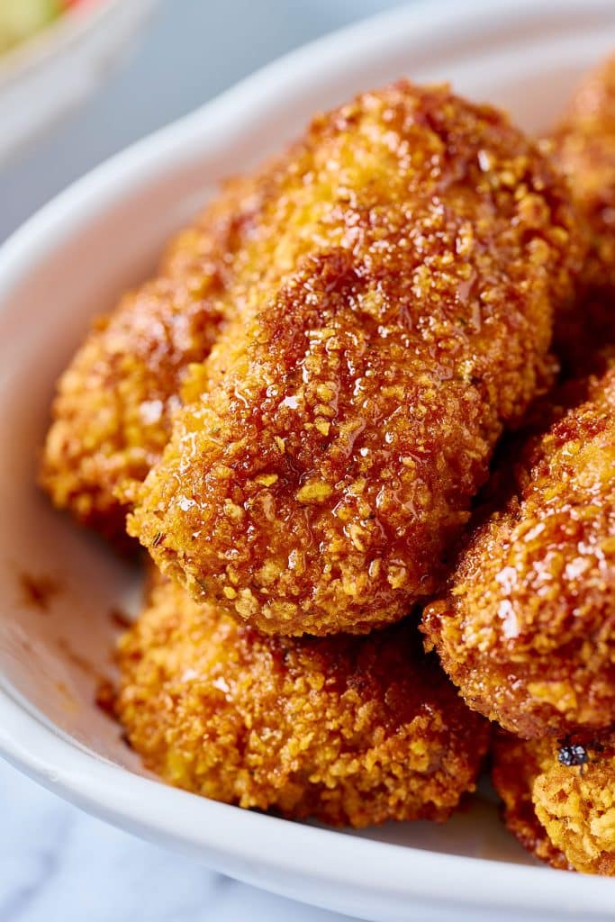 Close up of crispy chicken with hot honey