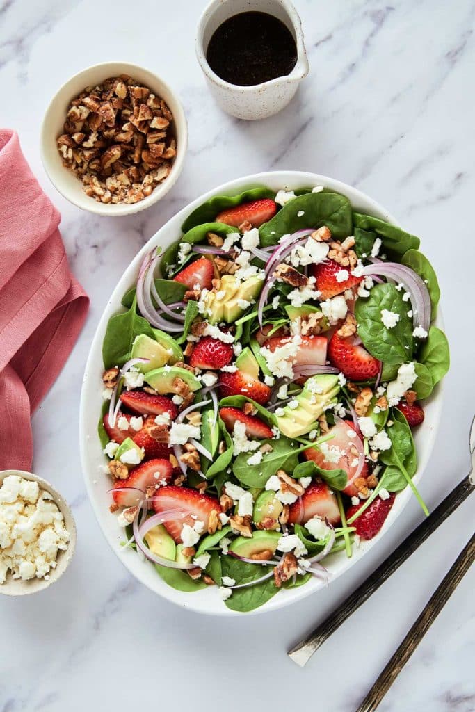 strawberry spinach salad with nuts and dressing