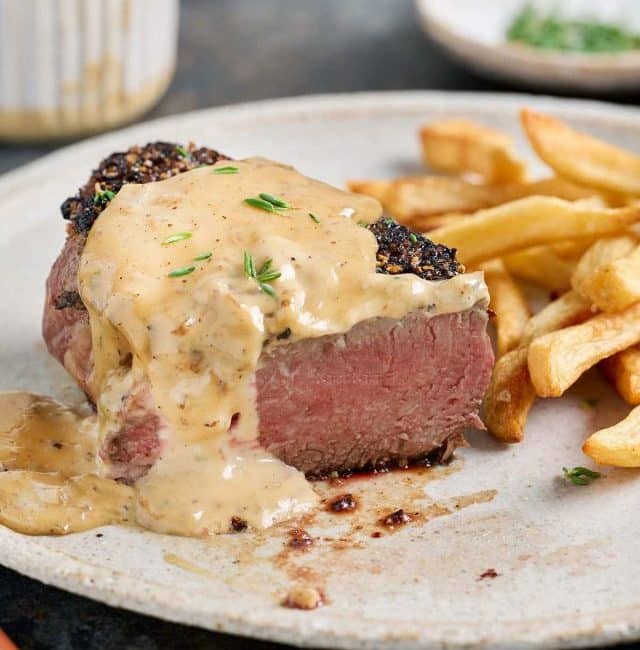 pepper crusted filet with au poivre sauce and french fries