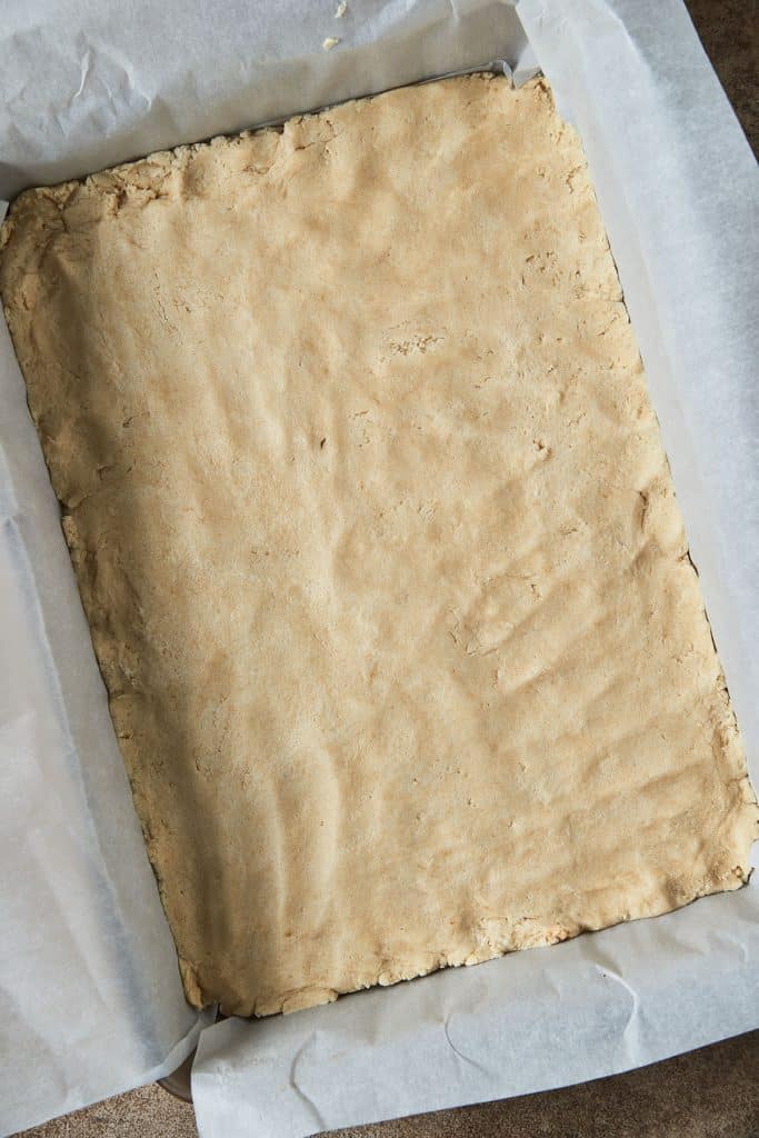 shortbread crust dough on a baking dish