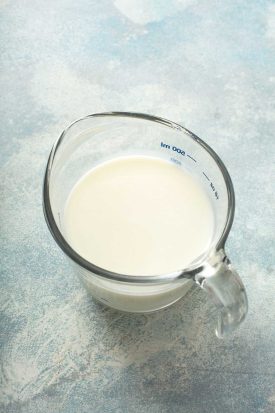 buttermilk and milk together in a measuring cup