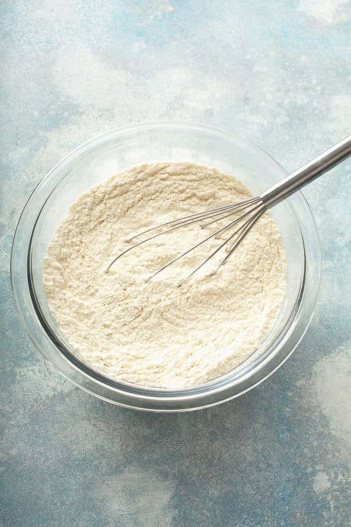 dry ingredients in a bowl with a whisk