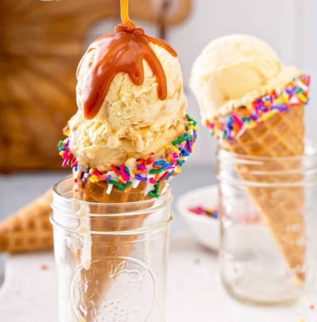drizzling caramel sauce over an sweet corn ice cream cone