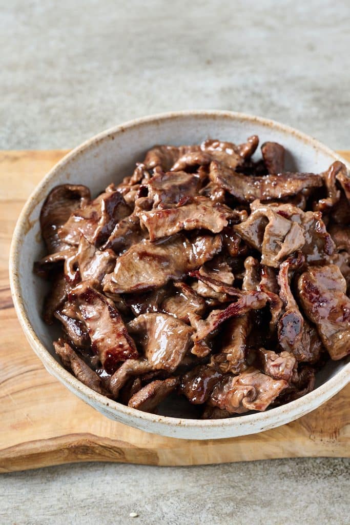 cooked steak in a bowl