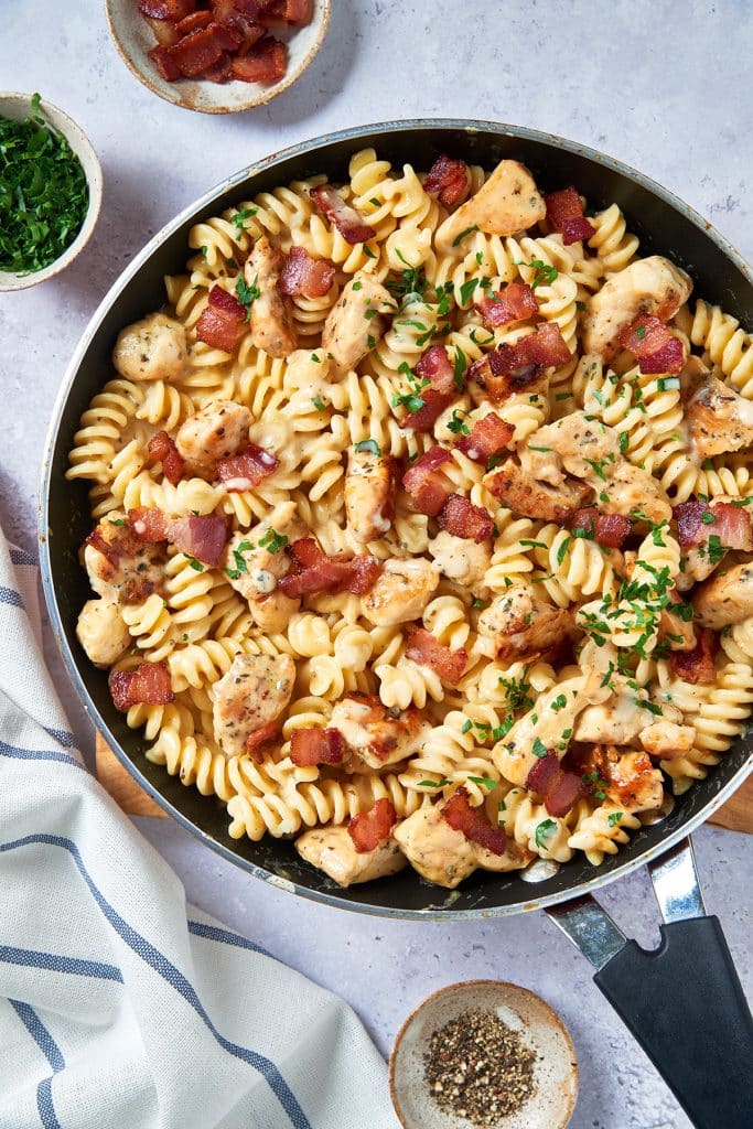 Pasta with chicken bacon and ranch sauce in a skillet