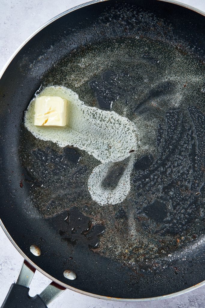 Butter melting in a skillet