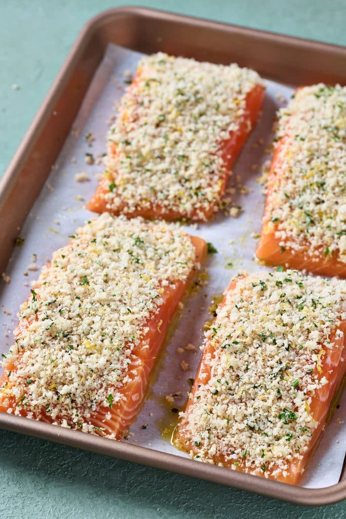 Raw salmon topped with panko and herb topping