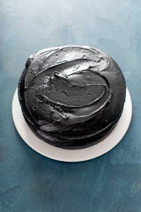 black velvet cake covered with black frosting