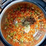 onions, carrots and celery stalks cooked in an instant pot